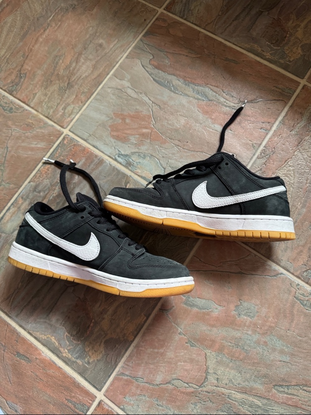 Nike Men’s Black Nike SB Dunks size 7 Sneakers with White Swoosh and Gum Sole